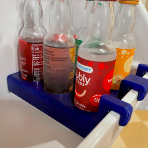 Uchwyt na butelkę smakową Sodastream do lodówki