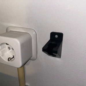 Montażowy uchwyt na przewody elektryczne na ścianie