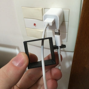 Uchwyt na kabel ładujący