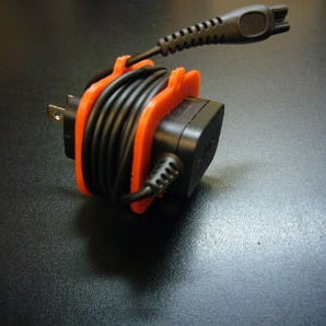 Uchwyt na kabel do maszynki do golenia