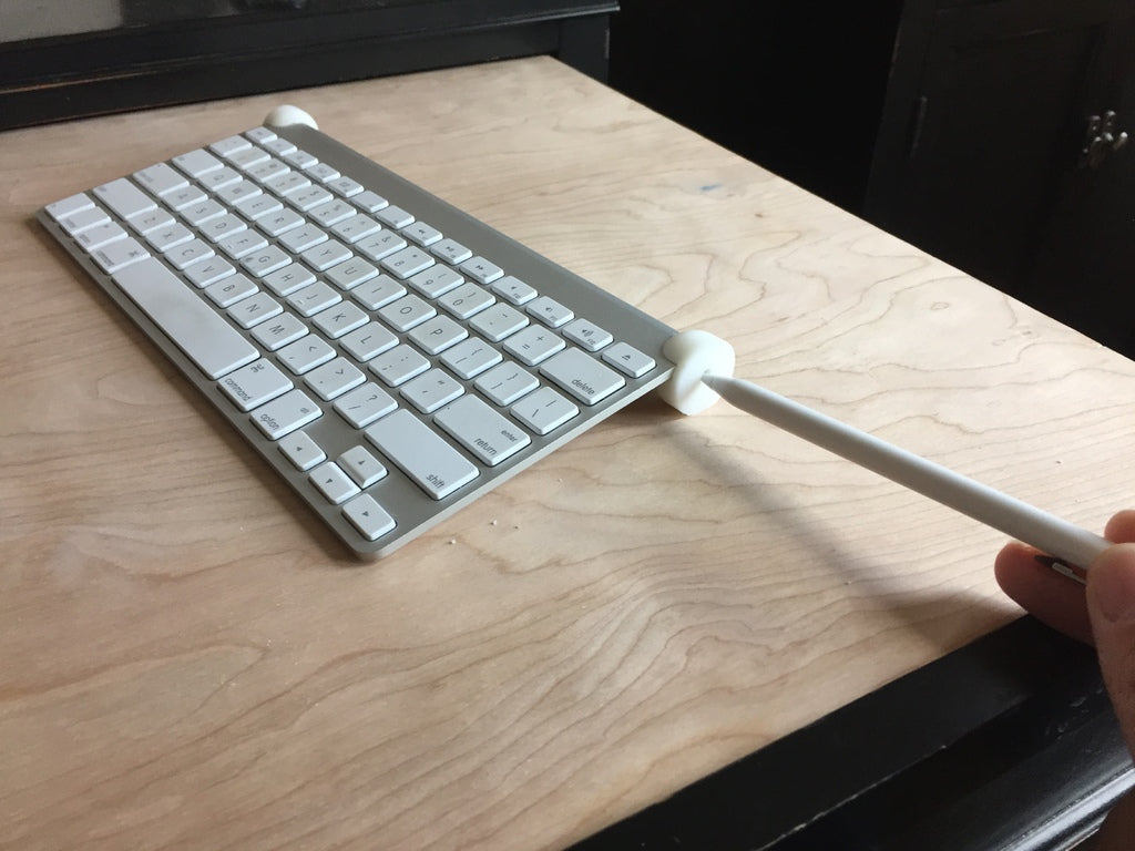 Osłona przycisku zasilania klawiatury bezprzewodowej Apple