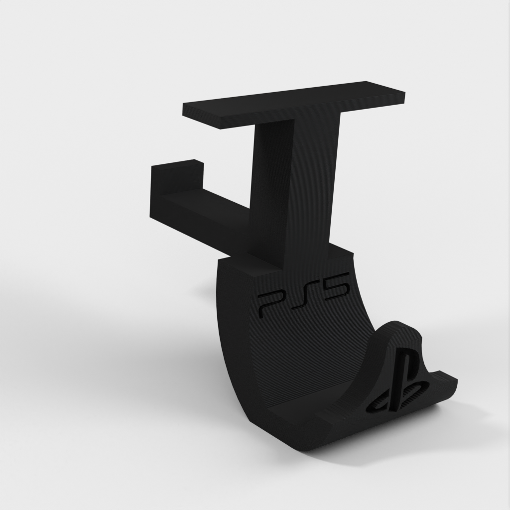 Montaż pod biurkiem kontrolera PS5 i zestawu słuchawkowego