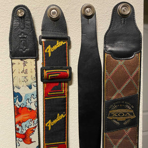 Uchwyt na pasek do gitary i podstawka Dunlop Strap Lock