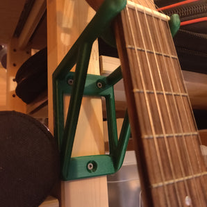Wieszak gitarowy do montażu na ścianie do małych i dziecięcych gitar