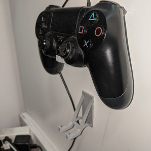 Elegancki uchwyt ścienny do kontrolera PS4