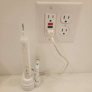 Uchwyt ścienny Oral B do ładowarki szczoteczki do zębów z zarządzaniem kablami