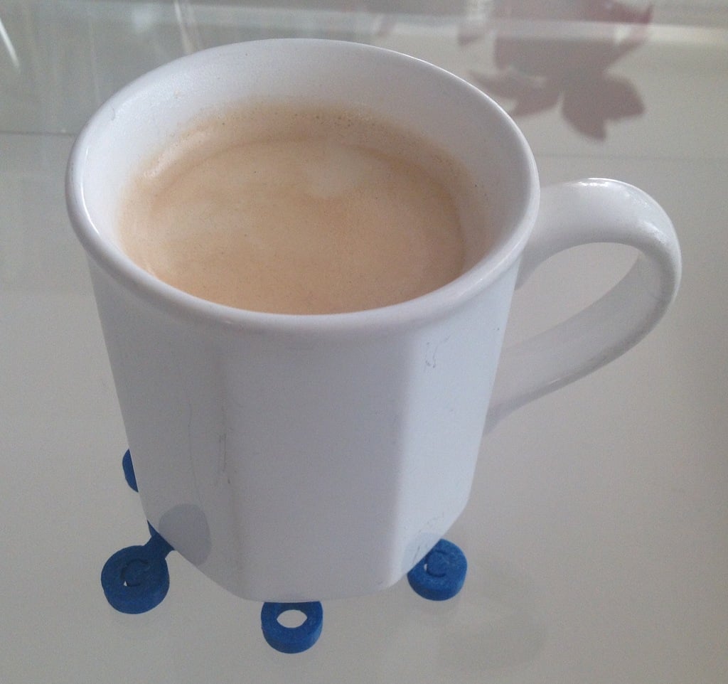 Podkładka z cząsteczkami kofeiny na filiżanki kawy