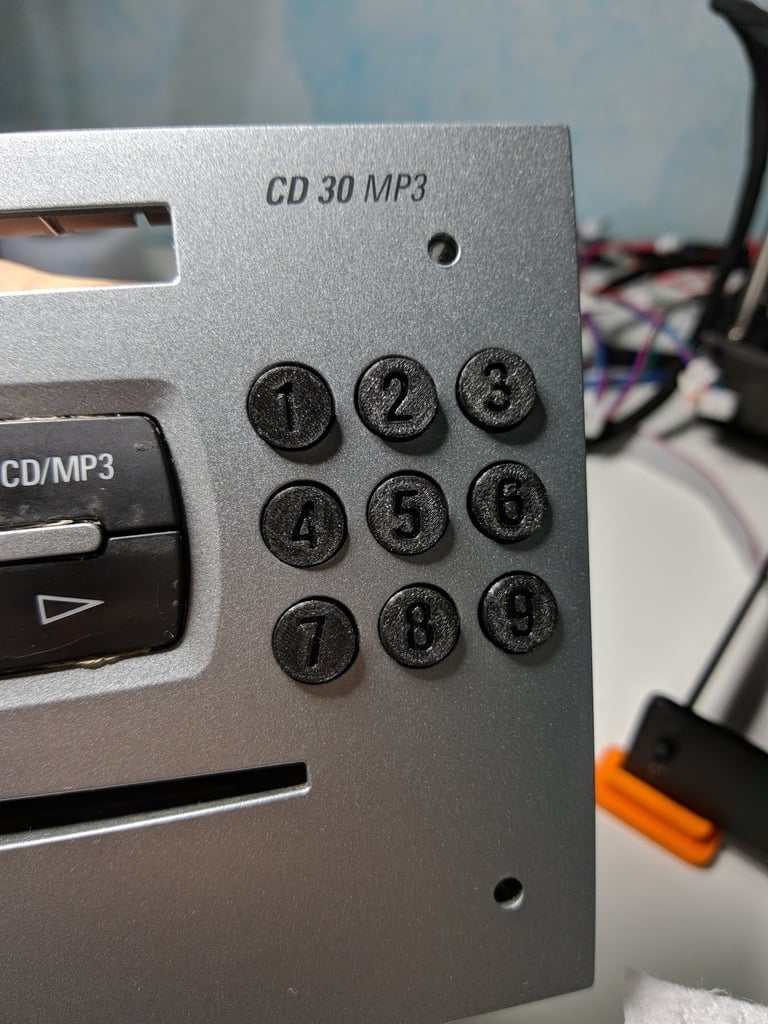 Zapasowe przyciski do radia samochodowego Opel CD30MP3