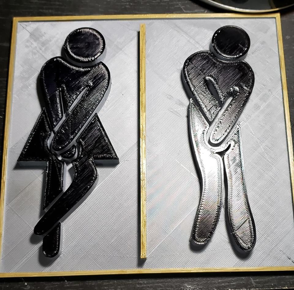 Znak toalety w restauracji - oddzielna wersja dla mężczyzn i kobiet