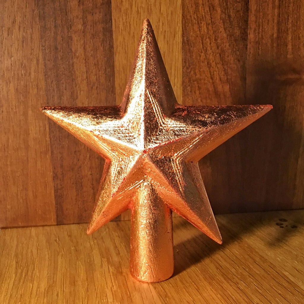 Ozdoby świąteczne w kształcie gwiazdek do zawieszenia i na wierzchołku drzewa