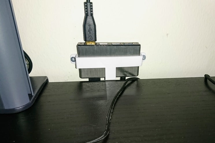 Uchwyt ścienny do 4-portowego koncentratora USB Icybox IB-AC610