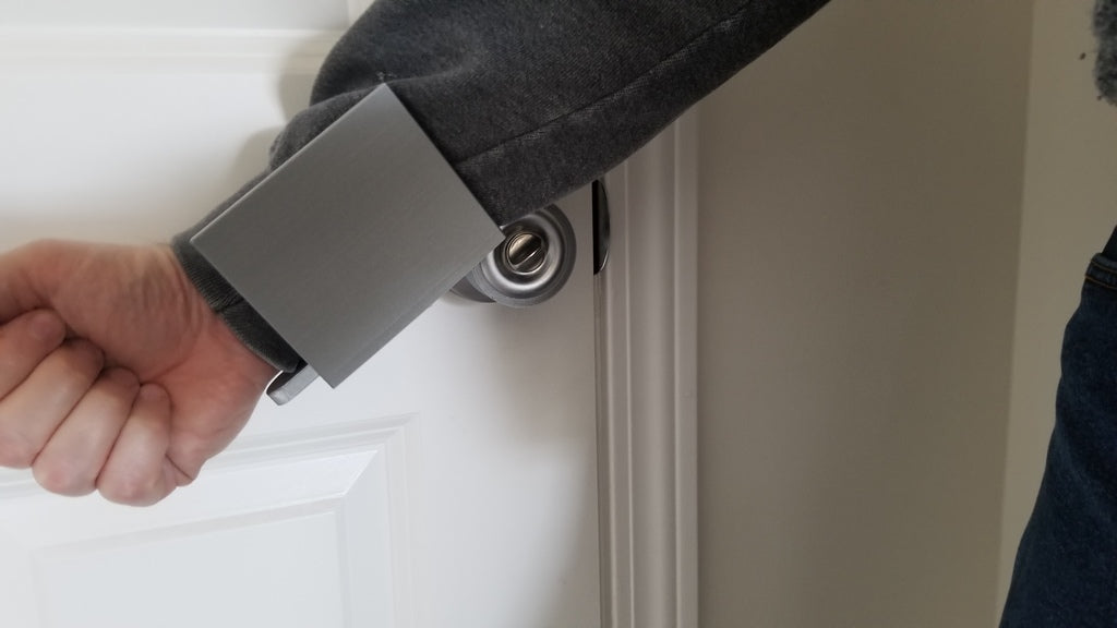 Adapter otwierania drzwi do obsługi ramienia