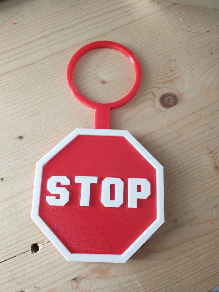 Panel klamki z napisem „Stop” zapewniający tajemnicę i niespodziankę